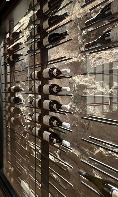 At Home Wine Cellar, Wine Bottle Display Wall, Stone Wine Wall, Boutique Wine Shop, Wine House Design, Corner Wine Cellar, Residential Wine Wall, Backlit Wine Wall, Wine Wall Dining Room