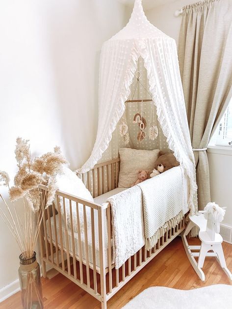 Whimsical boho nursery | Baby girl room decor, Baby crib canopy, Nursery baby room Nursery Crib Canopy, Cribs With Canopy, Canopy In Nursery, Nursery With Canopy Over Crib, Minimalist Neutral Nursery, Crib With Mobile, Canopy For Crib, Nursery With Canopy, Baby Room Inspiration Neutral