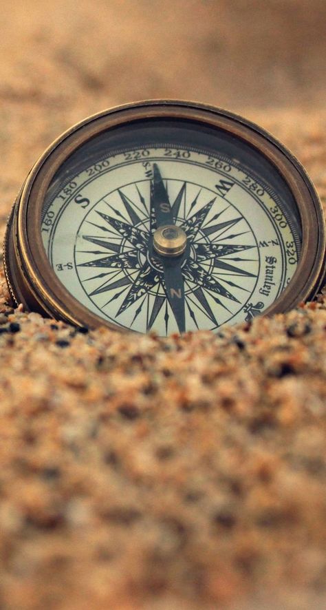 Compass in the sand iPhone wallpaper Compass Wallpaper, Wallpaper Travel, Nautical Aesthetic, Map Wallpaper, A Compass, Travel Wallpaper, Compass Rose, Travel Maps, A Quote