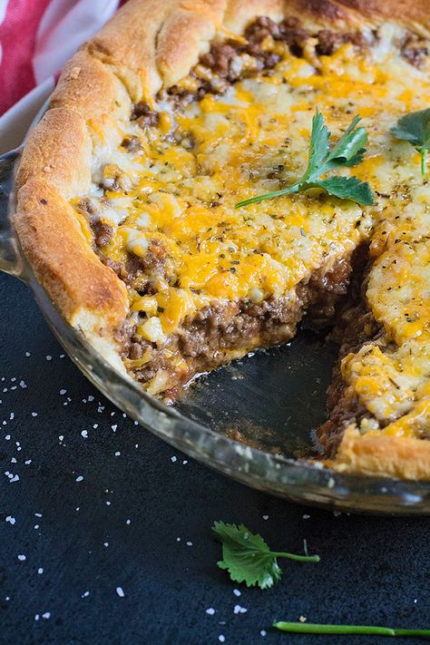 20-minute taco pie with crescent rolls is a simple recipe to get dinner on the table quick. Using crescent rolls means there's no fussy pie crust and you can customize this recipe to your family's favorites too. Taco Pie With Crescent Rolls, Crescent Roll Recipes Dinner, Crescent Roll Crust, Crescent Recipes, Taco Pie, Crescent Roll Recipes, Crescent Rolls, Beef Dishes, Mexican Dishes