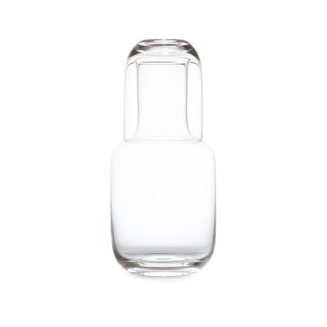 Known for its exquisite hue and sparkle, this semi-lead crystal carafe is individually crafted, resulting in beautiful curves of exquisite proportions. This two piece set functions as both lid and drinking glass. Perfect on the night stand or kitchen table. Made in Japan. Bedside Carafe, Carafe Set, Light Travel, Glass Carafe, Apartment Decorating, Night Stand, Beautiful Curves, Drinking Glass, Travel Light