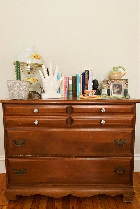 Eclectic Dresser Decor, Dresser Clutter Aesthetic, Books On Dresser, Dark Academia Dresser Decor, Dresser Plant Decor, Dresser Organization Top Of, Cluttered Dresser Top Aesthetic, Decor Dresser Top, Dresser Aesthetic