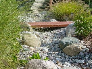 25 Inspiring Dry River Bed Landscaping Ideas in 2019 | Own The Yard Backyard Water Feature Diy, Dry Riverbed Landscaping, Stream Bed, River Rock Garden, Diy Water Feature, Dry Creek Bed, Dry River, Backyard Water Feature, Backyard Flowers