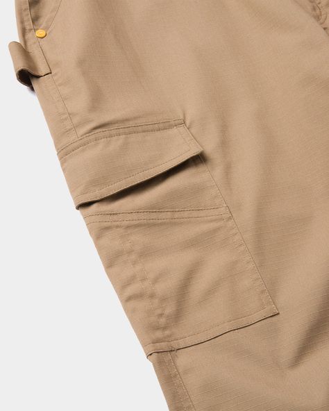 Introducing the Ripstop Cargo Pant!⁠ ⁠ This pant is engineered from durable stretch ripstop fabric, these straight-fit pants feature secure cargo pockets, a hammer loop, and reinforced belt loops.⁠ ⁠ #catworkwear Straight Fit Pants, Ripstop Fabric, Cargo Pant, Fit Pants, Workout Pants, Pants, Fabric, Quick Saves, Trousers