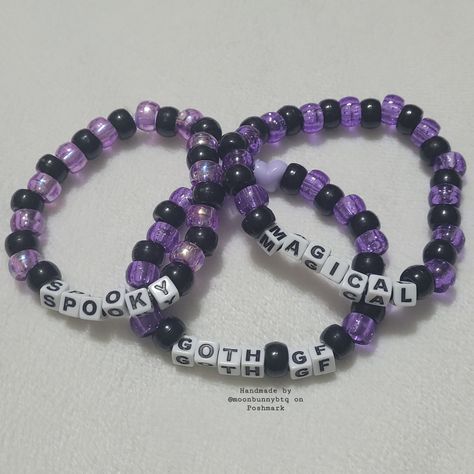 Glittery Black And Purple Pony Bead Bracelet "Magical" Glittery Black And Purple Pony Bead Bracelet "Goth Gf" Black And Holographic Purple Pony Bead Bracelet "Spooky" Double Stranded Elastic Kandi Bracelet Perfect For Emo, Scene, Y2k, Rave, Festival, Goth, Pastel Goth, Egirl, Gamer, Lgbt Pride Aesthetics. Elastic Bracelet Has Fair Stretch. Model Wrist 6.5" Model Hand 7.5" Please Check Measurements For Both. Please Do Not Exceed 8" Width, Elastic Will Break More Sizes Will Be Included Soon. Stock Kandi Bracelets Rave Goth, Matching Word Bracelets, Witchy Friendship Bracelet, Purple Kandi Bracelet, Brainrot Bracelets, Scene Kid Bracelets, Kandi Bracelets Aesthetic, Kandi Bracelets Tutorial, Pony Bead Bracelets Ideas