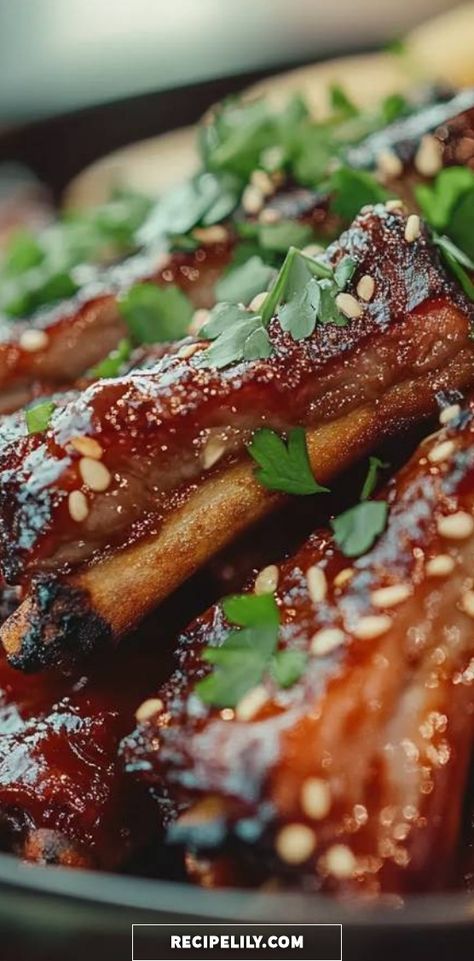 Dive into the irresistible goodness of these sticky sesame ribs! Tender and glazed with a sweet and savory sauce, they are topped with fresh herbs for a burst of flavor. Perfect for dinner or a weekend BBQ, I guarantee they'll be a hit with family and friends. Don't miss out on this scrumptious recipe! Sticky Ribs Recipe, Recipes For Bbq, Sticky Ribs, Grilled Ribs, Glazed Ribs, Barbecue Food, Rib Sauce, Basting Sauce, Homemade Barbecue Sauce