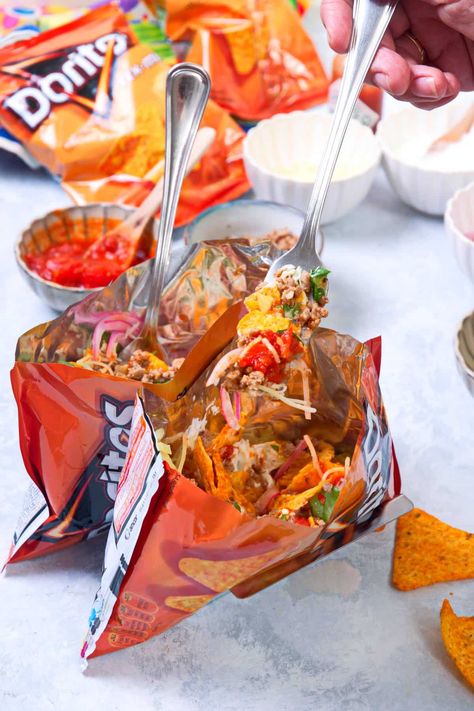 Change up your Taco Tuesday routine with these walking tacos, also known as taco in a bag! Recipe at inthekitch.net #inthekitch #walkingtacos #tacoinabag Mexico Tacos, Nacho In A Bag, Tacos In A Bag, Walking Tacos Doritos, Walking Taco, Walking Nachos Doritos, Dorito Walking Taco, Doritos Walking Taco, Taco Bag Doritos