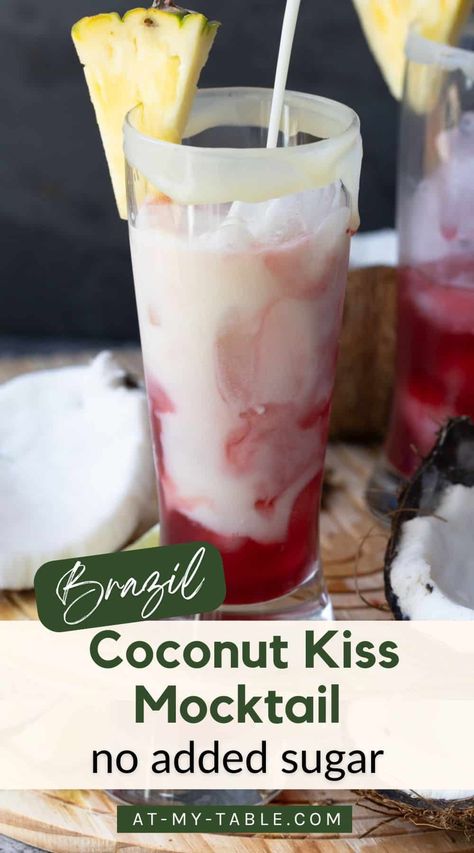 Want a refreshing drink without added sugar? Try this Brazil-inspired Coconut Kiss Mocktail. It’s naturally sweet with fruit juices and layered with coconut cream, pineapple, cherry, and lime. Dairy-free and gluten-free, it’s perfect for everyone. Coconut Milk Mocktail Recipe, Coconut Drinks Nonalcoholic, Ovulatory Recipes, Drinks With Coconut Milk, Coconut Milk Drinks, Coconut Mocktail, Lychee Mocktail, Kiss Cocktail, Coconut Milk Drink