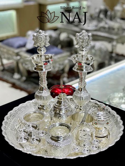 A complete Pooja set....Call or Whatsapp us on 9032041323 or email to mynaj@najindia.com... Available Only @ Naj Jewellery, Nellore.#TANAUSA, #TeluguUSA #silverware #gift #giftitems Silver Pooja Items Set, Silver Pooja Items Indian, Naj Jewellery, Silver Home Accessories, Puja Items, Winter Bridal Jewelry, Silver Jewellry, Pooja Thali, Silver Furniture