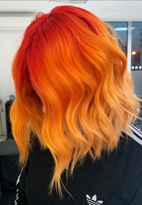 Orange color hair Orange Hair Color Ideas Short Hair, Fantasy Hair Color 2023, Orange Hair With Red Tips, Yellow To Orange Hair, Yellow Orange Hair Color, Monochromatic Hair Color, Orange Bayalage Hair, Yellow And Red Hair, Monochromatic Hair