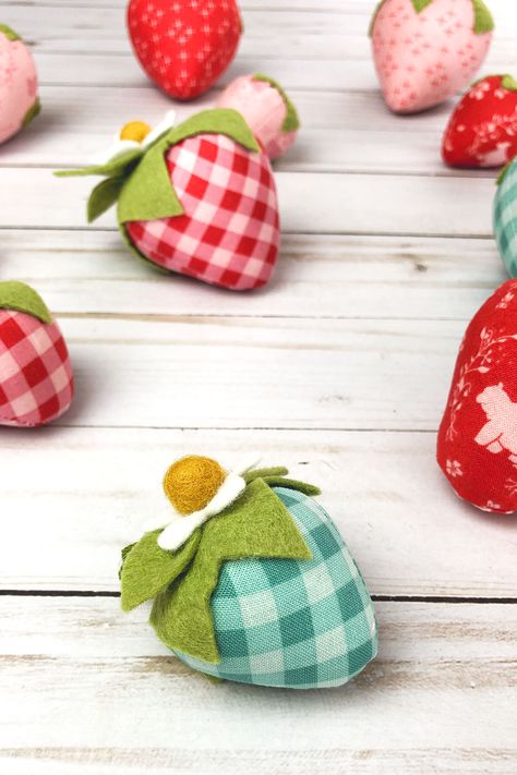 Strawberries made from fabric and felt using a sewing pattern. How To Sew A Strawberry, How To Make Fabric Strawberries, Fabric Strawberry Pattern, Fabric Strawberries Pattern, Sewing Strawberry, Sew Strawberry, Mags Rags, Strawberry Sewing, Watermelon Fabric