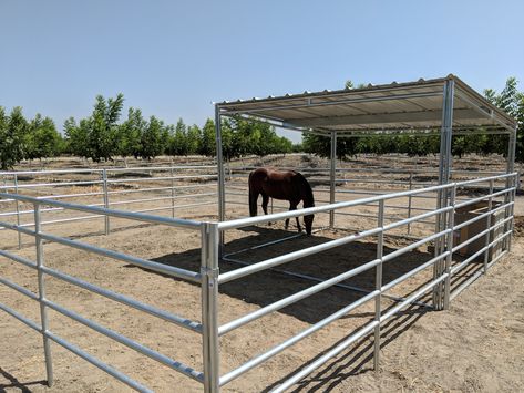 KRE Value Shelter Kit $999 12x12 Perfect for covering in horse pen, arena  All modular shelters made with USA Galvanized steel  Contact us for more details Horse Pen Ideas, Horse Pasture Shelter, Simple Horse Barns, Round Pens For Horses, Pasture Shelter, Horse Shelters, Cattle Gate, Horse Shed, Horse Pens