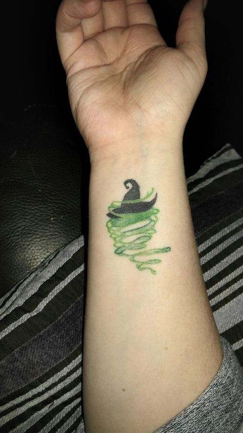 Wicked Witch of the West tattoo Elphaba Tattoo Ideas, Elphaba Tattoo, Wizard Of Oz Tattoo Small, Wizard Of Oz Tattoo Ideas, Wicked Tattoos Musical, Wicked Musical Tattoo, Broadway Tattoos, Wizard Of Oz Tattoo, West Tattoo