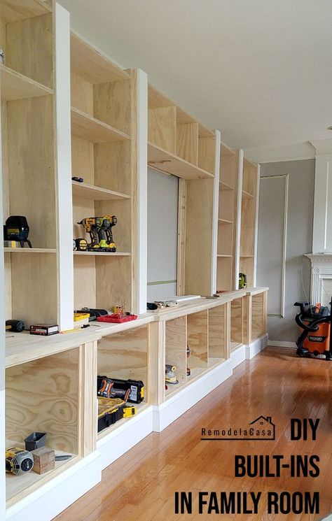 DIY - Family Room Built-Ins - Building and Installing The Shelves - Remodelando la Casa #thdprospective Built In Shelves Basement Family Room, Built In Storage Shelves Basement, Build Your Own Built In Bookcase, Diy Living Room Cabinets Built Ins, Wainscoting Family Room, Living Room Built Ins Diy, How To Make Built In Cabinets, Diy Built In Bookcase Around Tv, Diy Living Room Built Ins With Tv