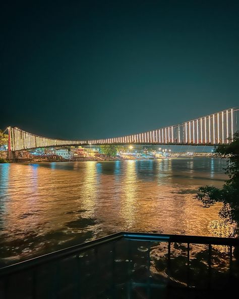 📍Ram Jhula , night vs day Strolling across Ram Jhula is like walking through a page of history. This iconic suspension bridge, built in the 1980s, connects the two bustling banks of the Ganges River. It’s named after Lord Rama and offers breathtaking views of the river and the surrounding Himalayan foothills. The peaceful vibe here is perfect for meditation and soaking in the beauty of Rishikesh. 🌿🌊 #RishikeshDiaries #RamJhula #travelindia #HimalayanBeauty #SpiritualJourney #IncredibleIn... Ramjhula Rishikesh, Ganges River, Rishikesh India, Lord Rama, Suspension Bridge, 2025 Vision, Rishikesh, India Travel, Spiritual Journey