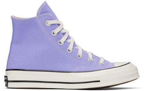 High-top cotton canvas sneakers in purple. · Round rubber cap toe · Lace-up closure · Eyelet vents at inner side · Logo patch at inner side · Ortholite® insole · Rubberized logo patch at heel · Treaded rubber sole · Contrast stitching in white Supplier color: Ultraviolet/White/Black Cute Converse Shoes, Purple Converse, Cute Converse, Preppy Shoes, Vintage Sneakers, Black Converse, Purple Shoes, Cute Nikes, Chuck 70