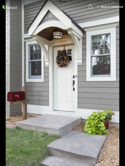 . Portico Entry, Front Door Overhang, Door Overhang, White Front Door, Concrete Walkway, Door Awnings, Cape House, Cape Cod House, Front Entry Doors