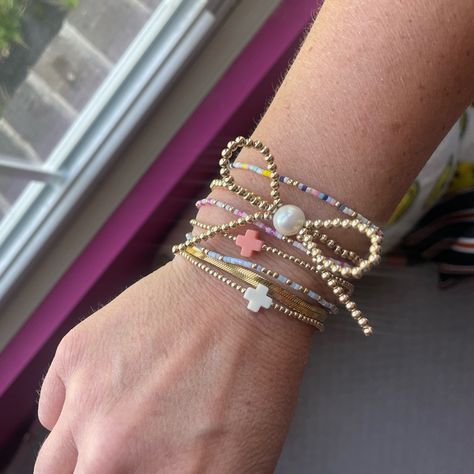 14k Gold Beaded Stretchy Bracelet Bow With Pearl Shown In A Stack Wore With Others. Only Bow Bracelet For Sale Bow Beaded Bracelet, Beaded Bow Bracelet, Acrylic Beads Bracelet, Enewton Stack, Enewton Bracelets Stacks, Christmas Bracelets Beaded, Preppy Ideas, Beaded Bracelet Stack, Jewelry Stack