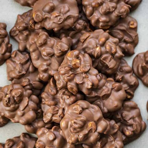 Crockpot Candy - i am baker Crockpot Candy Recipes, Crockpot Desserts, Chocolate Peanut Clusters, Trisha Yearwood Recipes, Easy Christmas Candy Recipes, Crockpot Candy, Peanut Clusters, Christmas Candies, Chocolate Candy Recipes