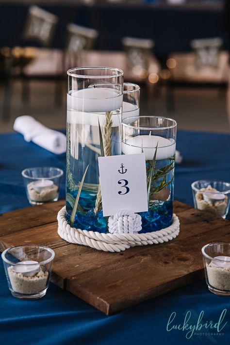 Nautical Centre Piece, Boat Wedding Centerpieces, Sailing Wedding Decorations, Sailing Centerpieces, Simple Nautical Centerpieces, Cruise Centerpieces Table Decorations, Nautical Wedding Inspiration Table Decor, Buoy Wedding Centerpiece, Cruise Themed Centerpieces