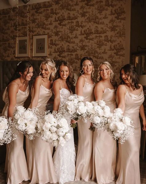 3 reasons why champagne bridesmaid dresses are so classy ✨ Neutral wedding palettes are HUGE for 2025 and It’s no secret that we love this colour palette. We’re talking about all those yummy, delicious Champagne, Gold and Creamy colours which work beautifully, especially in satin fabrics. Here’s our 3 reasons why you should look to a neutral palette and consider champagne as your bridesmaid colour… ✨ It’s easy to wear. There are various shades, from nude, to gold, to metallic. Therefore, ... Light Gold Satin Dress, Champagne Colour Theme Wedding, Champagne Wedding Colors Palette, Champagne Colour Bridesmaid Dresses, Creamy Neutral Wedding, Neutral Champagne Bridesmaid Dresses, Bridesmaid Colour Palette, Champagne Color Palette Wedding Colour Schemes, 2025 Bridesmaid Dresses