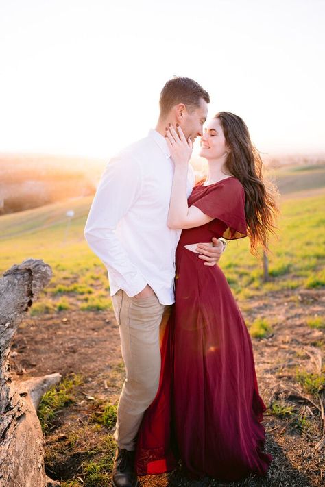 Preshoot Dress Ideas, Wine Red Engagement Dress, Maroon Dress Engagement Photos, Engagement Photos Burgundy Dress, Engagement Photos With Red Dress, Maroon Engagement Photos, Red Dress Couple Photoshoot, Wine Red Dress Engagement Pictures, Poses For Couples Engagement