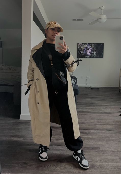 Sweat Pants Trench Coat Outfit, Sweats And Trench Coat Outfit, Tracksuit And Coat Outfit, Monochrome Trench Coat Outfit, Edgy Trench Coat Outfit, Sweatsuit And Trench Coat, Sporty Trench Coat Outfit, Airport Outfit Trench Coat, Long Coat With Hoodie Outfit