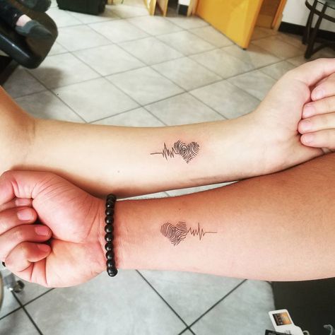 37 Matching Tattoos For Couples Who Want to Make a Small Statement Fingerprint Tattoo Ideas, Thumbprint Tattoo, Fingerprint Tattoo, Tattoo Ideas For Couples, Fingerprint Heart Tattoos, Fingerprint Tattoos, Him And Her Tattoos, Mother Son Tattoos, Small Matching Tattoos