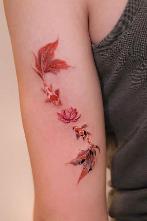 Koi fish tattoos are a popular choice for both men and women, and for good reason. They're beautiful, they're meaningful, and they're incredibly versatile. Check out these 35 inspirational koi fish tattoo designs to find the perfect one for you! #koifishtattoo #tattoodesign . #Japanese_Water_Flower_Tattoo #Elegant_Koi_Fish_Tattoo #Cherry_Blossom_With_Koi_Fish_Tattoo #Two_Dragons_Back_Tattoo Unique Koi Fish Tattoo, Koy Fish Tattoos Small Simple, Fineline Koi Fish Tattoo, Tattoo Ideas Koi Fish, White Koi Fish Tattoo, Traditional Japanese Koi Fish Tattoo, Koi Fish Tattoo For Women, Koi Fish Back Tattoo, Coi Fish Tattoo