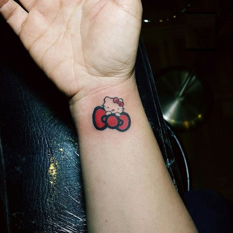 Cute Tattoo Designs For Women, Wrist Tattoo Women, Cute Tattoo Designs, Hello Kitty Tattoo, Cute Tattoos On Wrist, Kitty Tattoo, Wrist Tattoo Ideas, Cute Tattoo, Bts Tattoos