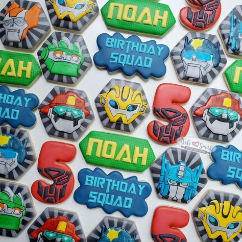 Rescue Bot decorated sugar cookies. Transformer Cookies, Transformer Cookies Decorated, Transformers Cookies Decorated, Power Ranger Cookies Decorated, Rescue Bots Cake, Transformers Rise Of The Beast Birthday, Rescue Bots Birthday Party, Rescue Bots Party, Baby Party Ideas Boy