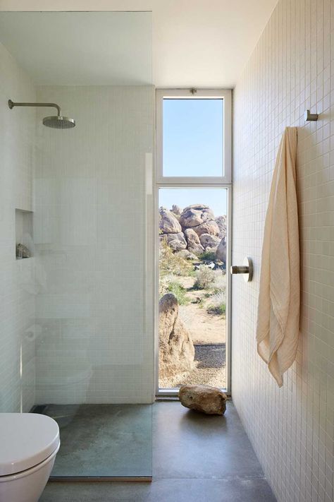 A House That Blends Into The Color Palette Of The Surrounding Desert Desert Bathroom, Modern Desert Home, White Oak Furniture, 2023 Picture, Cedar Walls, Window In Shower, Modern Desert, Tall Windows, Tile Covers