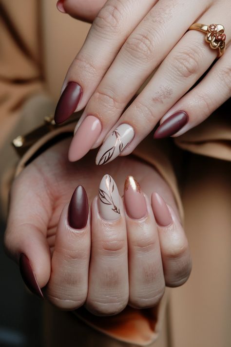 Elevate your style this season with these gorgeous fall nail ideas that exude Autumn simple elegance. Picture soft, muted tones like burnt orange and deep burgundy, adorned with delicate gold accents or minimalist leaf designs. This nail style is perfect for any occasion, offering a refined yet cozy vibe that captures the essence of fall. Embrace the beauty of the season with nails that shine! Autumn Minimalist Nails, Rusty Orange Nails Design, Autumn Nails Burnt Orange, Fall Nails Burnt Orange And Gold, Burgundy Nails With Fall Leaves, Autumn Nails Leave, Leaf Nail Designs, Festive Nails, Fall Nail Ideas