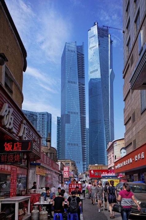 Eton Place Dalian. Located in Dalian, China, this skyscraper is designed by NBBJ. The 1,257-foot-tall building is scheduled to be completed in September 2016. Mecca Tower, Skyscrapers Architecture, Dalian China, Contemporary Architecture Design, Skyscraper Architecture, Dalian, Futuristic City, City Landscape, City Views