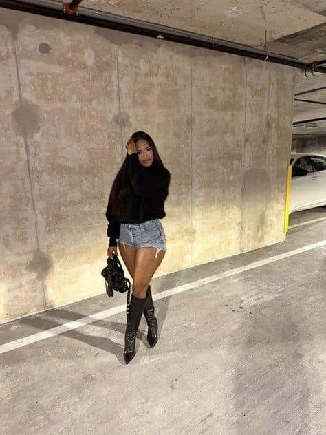 Tall Boots And Shorts Outfit, New Years Concert Outfit, Black Shorts Outfit Fall, Nye Outfit Ideas Black Women, Mini Skirt High Boots Outfit, Dr Martens Outfit Black Women, Short Jean Skirt Outfits Winter, Nike Vomero Outfit, Sparkle Heels Outfit