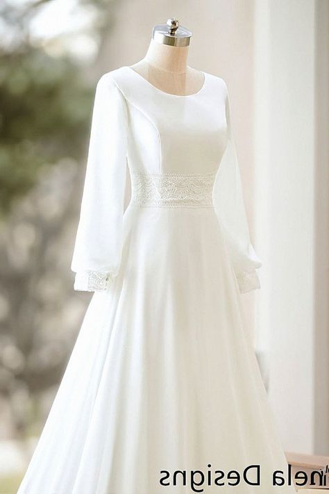 A timeless ball gown looks ideal for your big day. You can’t go wrong with this dress for your dream wedding style. Collect this inspiration to your wedding dress ideas. Conservative Wedding Dress, Wedding Dresses Lds, Modest Wedding Dresses With Sleeves, Wedding Dress With Long Sleeves, Long Sleeve Bridal Gown, Modest Bridal, Modest Wedding Gowns, Modest Wedding Dress, Floral Prom Dresses