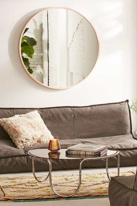 8 Designer-Approved Ways to Fill the Wall Above a Sofa | Hunker How To Feng Shui Your Home, Urban Outfitters Home, Above Couch, Salon Suites, Mirror On The Wall, Round Mirror, Couch Furniture, Boho Home, Apartment Room