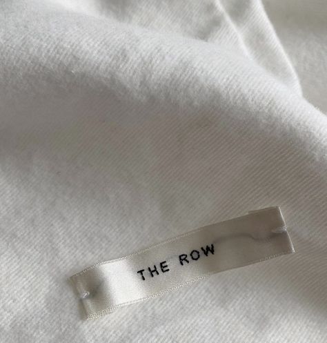 The Row Branding, The Row Packaging, The Row Aesthetic, Label Tag Clothing, Clothing Tags Label Branding, Clothes Tag Design Label, Fashion Hang Tag Design, Minimalist Clothing Brands, Clothing Labels Design