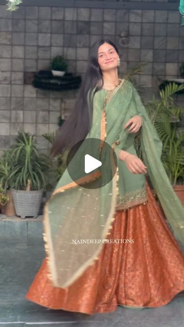 NAINDEEP KAUR on Instagram: "This outfit is made of a beautiful and everlasting sage green shirt which is paired with orange rust, pure brocade heavy flared sharara. It is decorated with intricate patterns that display a captivating design style and an elegant charm.  Outfit : @naindeepkaurcreations  . . #formals #semiformals #partydresses #partywear #weddingdress #pret #couture #bridal #bridalwear #punjabisuits #ethnicwear #vintagewesternwear #class #classicwear #royal designersuits #designerdresses #reels #trendingreels #reelsinstagram #reelsinstagram #reelsvideo #HauteCouture, #CoutureFashion, #DesignerWear, #LuxuryFashion #FashionElegance #CoutureMagic" Brocade Sharara Suit, Orange Sharara Suit, Indian Sharara Outfits, Brocade Suit Design, Sharara Designs Party Wear, Sharara Suit Indian Designers, Brocade Dress Styles, Brocade Sharara, Sharara Suit Design