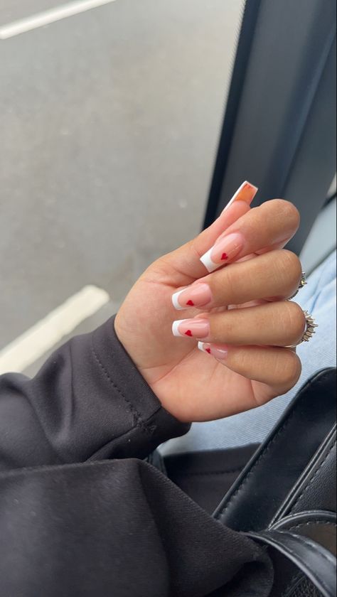 Valentine Nails Designs Square, Nail Inspo Valentines Day Square, Valentines Nails White French Tip, Pink French With Red Heart, French Red Heart Nails, White French Nails With Red Heart, Heart French Tip Nails Square, White Red French Nails, White French With Red Heart