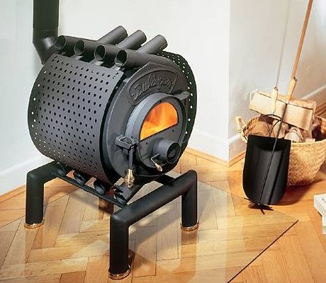 These unique wood burning stoves are handcrafted in Germany and have simple yet very effective design. The Energetic Bullerjan stove features cylindrical horizontal combustion chamber [...] Small Wood Burning Stove, Wood Burning Heaters, Diy Wood Stove, Stove Installation, Wood Stove Fireplace, Stove Heater, Wood Heater, Cooking Stove, Rocket Stoves