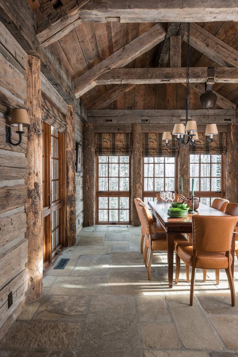 A Snowy Cabin in the Woods - Mountain Living Hunting Lodge Dining Room, Snowy Cabin In The Woods, Lodge Dining Room, Timber Frame Cabin, Snowy Cabin, Hand Hewn Beams, Central Building, Log Wall, Sky Home