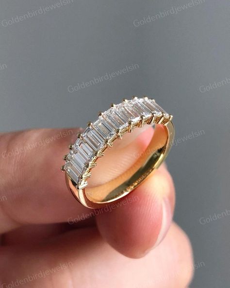 Baguette-Cut Moissanite Diamond Band, Dainty Half Eternity Wedding Band, 14K Yellow Gold Stackable Band, Promise Band, Handmade Jewelry ✥ 𝐌𝐚𝐭𝐜𝐡𝐢𝐧𝐠 𝐁𝐚𝐧𝐝 𝐃𝐞𝐭𝐚𝐢𝐥𝐬 ↣ Shape: Baguette Cut ↣ Type: Moissanite/CZ Diamond ↣ Total Weight: 2.5 Ct (App.). ↣ Color: Colorless ↣ Clarity: VVS ↣ Making Process: Handmade - Crafted by our experienced team ↣ Options: Lab Grown Diamond and Natural Diamond (Possible on request while placing an order and Extra Chargeable Service) ✥ 𝐑𝐢𝐧𝐠 𝐃𝐞𝐭𝐚? Emerald Anniversary Ring, Emerald Cut Wedding Band, Baguette Wedding Band, Promise Band, Moissanite Band, Half Eternity Wedding Band, Unique Bands, Yellow Gold Wedding Band, Gold Anniversary