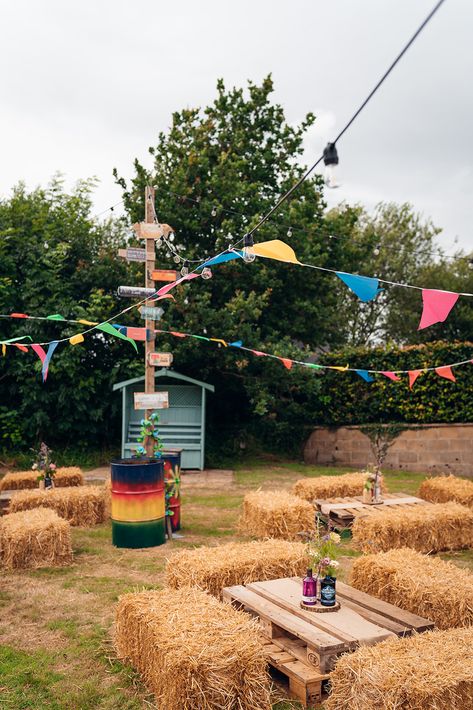 Outdoor Wedding Reception In A Field - Colourful Wedding Party Sign - Tipi Wedding In A Field - Unconventional Wedding - Festival Wedding Inspiration - Multi-coloured Bunting - Haybales For Seating - Wedding Field Festival Wedding Food Ideas, Summer Festival Ideas, Festival Wedding Table Decorations, Summer Festival Decorations, Music Festival Wedding Ideas, Festival Inspired Wedding, Festival Photo Booth Ideas, Festival Wedding Theme, Diy Festival Ideas