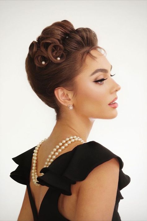 Jackie Wyers is posed with her side profile, showcasing the 60s inspired makeup and hair similar to the classic film "Breakfast At Tiffany's" starring Audrey Hepburn. 60s Curls, Modern Audrey Hepburn, Gala Hair, 60s Hair Tutorial, Jackie Wyers, Vintage Updo, French Twist Updo, Barbie Hairstyle, 1960s Hair