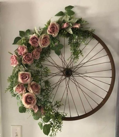 40+ Dollar Store Bicycle Wheel Wreath Ideas that look absolutely stunning | HubPages Summer Wreath, Gubahan Bunga, Deco Champetre, Flowers And Greenery, Bicycle Wheel, Deco Floral, Diy Wreath, Spring Wreath, Spring Decor