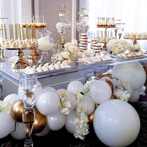 374 Likes, 6 Comments - Amalfi Décor (@amalfi_decor) on Instagram: “Luxury at its finest ✨ White and gold wedding dessert table styled by @itsyourparty_atl with Amalfi…” White Candy Table, Engagement Party Desserts, Gold Dessert Table, Sweets Table Wedding, Wedding Cake Table Decorations, Dessert Stands, Star Baby Shower Theme, Cake Table Decorations, Wedding Cake Table