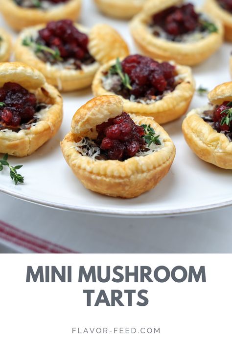 These mini mushroom tarts with lingonberry jam make a fabulous appetizer. Purchased puff pastry makes them a cinch to prepare, but the best part is that they can be made ahead and frozen. When you’re ready to serve, just pop them in the oven for 15 minutes, top with the sweet, tart lingonberry or raspberry jam and watch them disappear! #easyappetizers #mushroomtarts #mushroomappetizers #puffpastyappetizers #puffpastrymushroomtarts #holdiayappetizertideas Mushroom Puff Pastry, Mushroom Tarts, Lingonberry Sauce, Puff Pastry Tarts, Lingonberry Jam, Mushroom Tart, Mushroom Appetizers, Puff Pastry Tart, Mini Mushroom