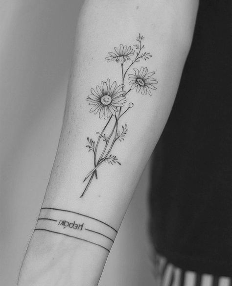 Michaelmas Daisy Tattoo, Flower Through Concrete Tattoo, Three Daisy Tattoo, Daisy And Lily Tattoo, Gerber Daisy Tattoo Small, Margherita Tattoo, Black And White Daisy Tattoo, Daisy Spine Tattoo, Daisy Flower Tattoo Designs