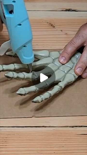 Hometalk on Instagram: "Grab 5 Dollar Tree skeleton hands...💀🧙‍♀️🎃👻" Scary Halloween Wall Decor, Painting Skeleton Hand, Dollar Halloween Diy, Halloween Hanging Planter Ideas, Skeleton Hands Holding Candles, Ancient Greece Decorations Diy, Tree Stump Halloween Ideas, How To Age Plastic Skeleton, Diy Skeleton Head Decor